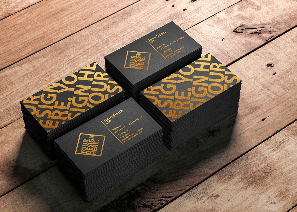 4-stacks-of-business-cards-on-a-wooden-table-mockup-psd-25
