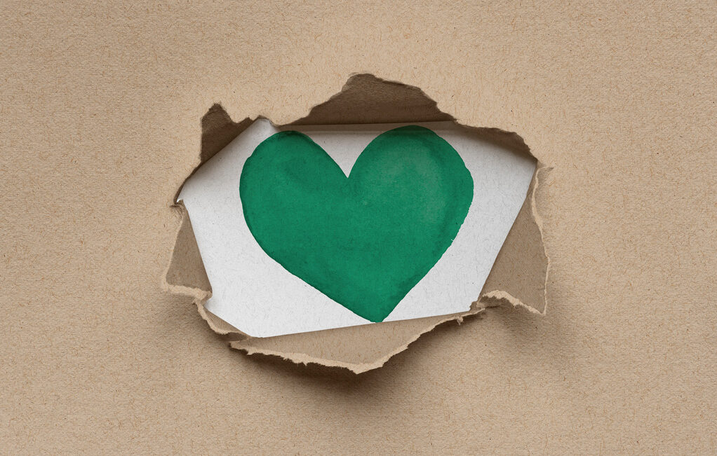 green-heart-inside-eco-friendly-torn-kraft-paperboard-psd-21
